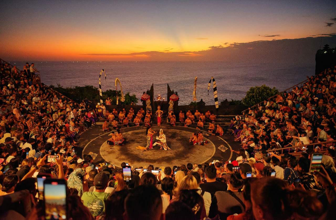 Traditional Kecak and Fire Dance performance at Uluwatu Temple during sunset in Bali.jpg
